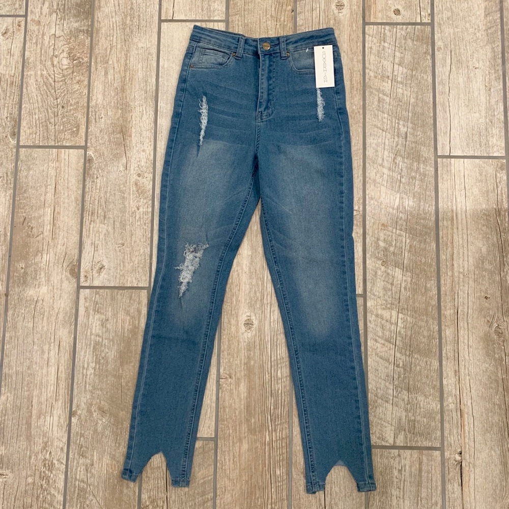 Distressed high waited denim jeans